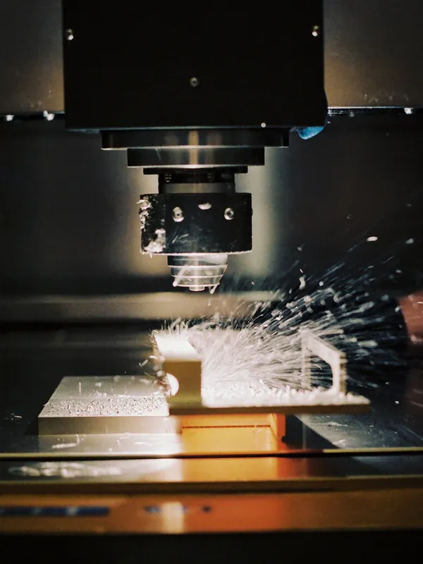 AI concept image: a CNC machine cutting an aluminium part